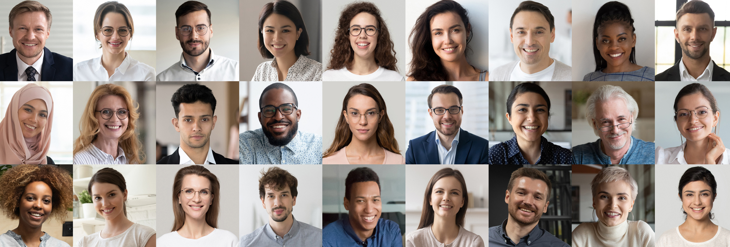 A diverse group of credit union members smile for the camera, showing their different identities, cultures, and beliefs.